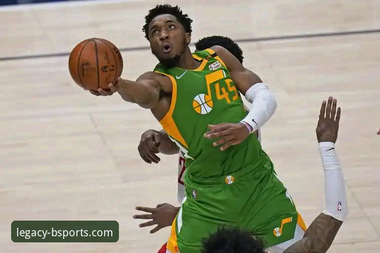 如何通过b体育官网下载苹果版，第一时间掌握米切尔42分终结魔术六连败的精彩战报？